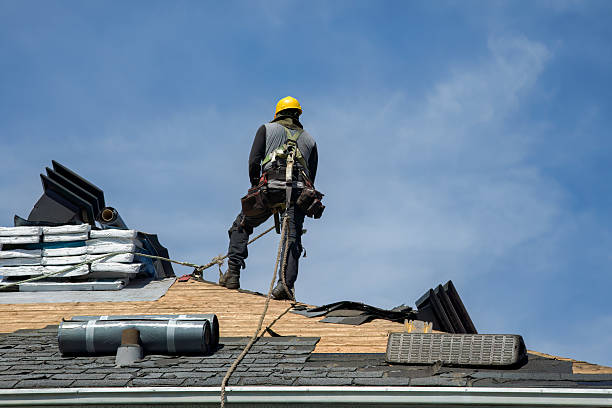 Professional Storm Damage Roof Repair technician working in Vero Beach, FL